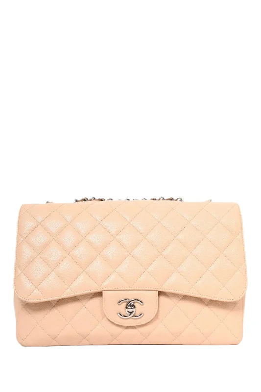 Pre-loved Chanel™ 2010/11 Beige Caviar Leather Jumbo Classic Flap Bag